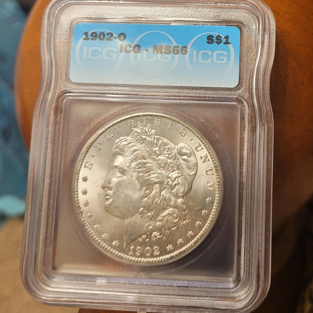1902 O Morgan silver dollar coin MS66
